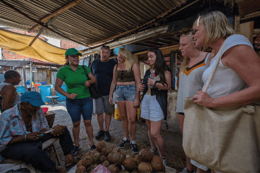 Visit the public market and dance like a real local